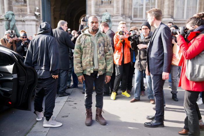 Kanye West near Photographers